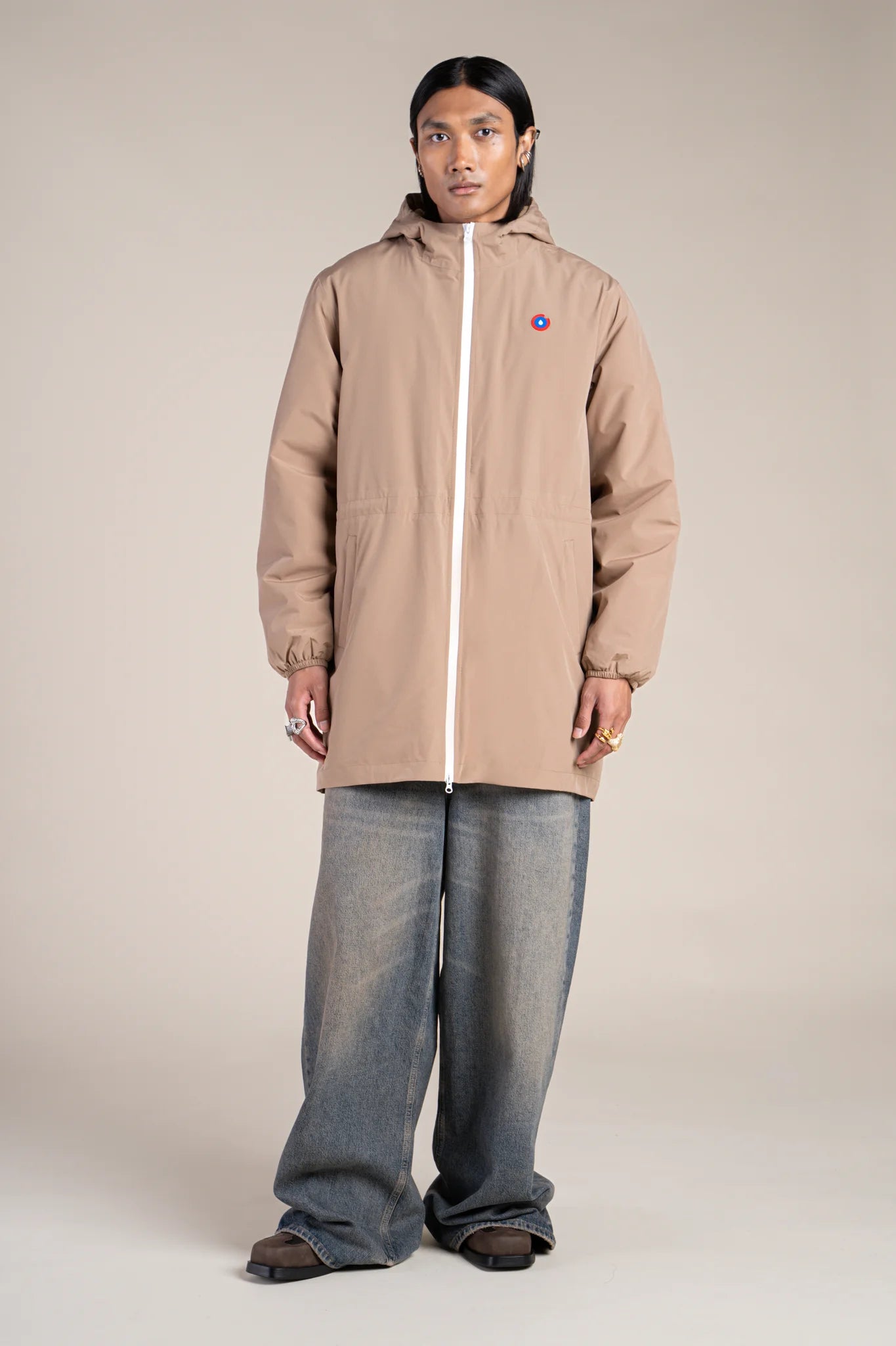 Long waterproof jacket with beige lining 