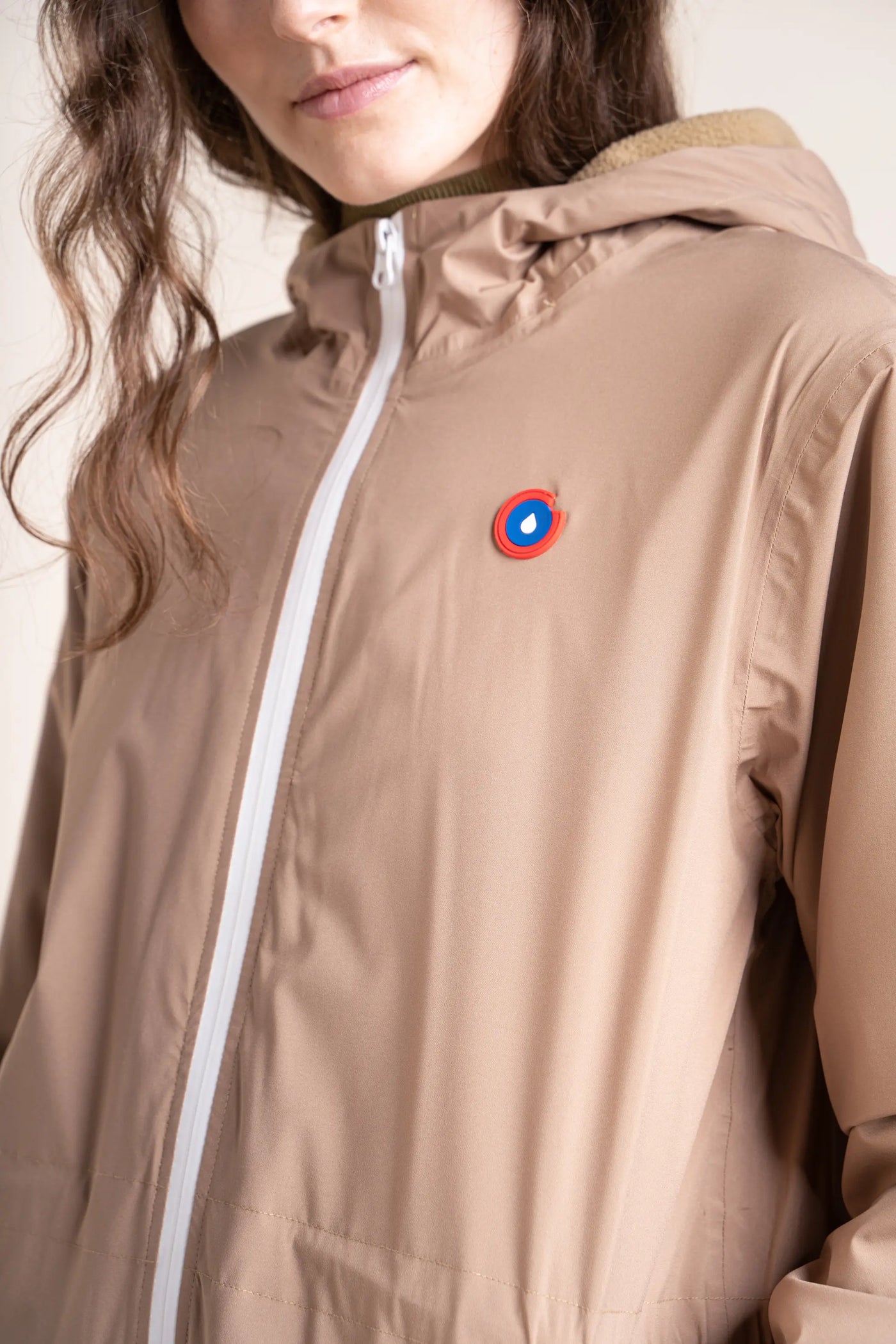 Waterproof and fleece-lined long jacket #couleur_sahara