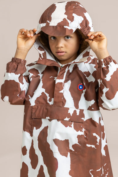 Avron - Waterproof rain cape for kids - Cow print color Flotte #couleur_cow