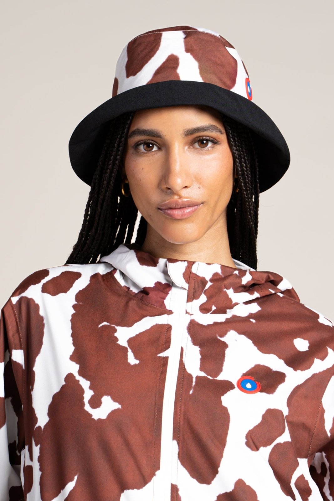 The Reversible Bucket hat - Waterproof Bucket hat - Flotte color Black printed cow Black