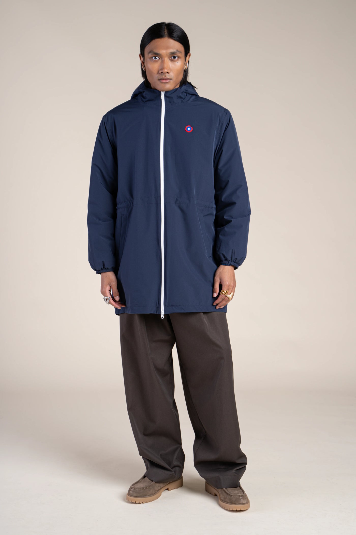 Long, waterproof jacket with navy blue indigo lining 