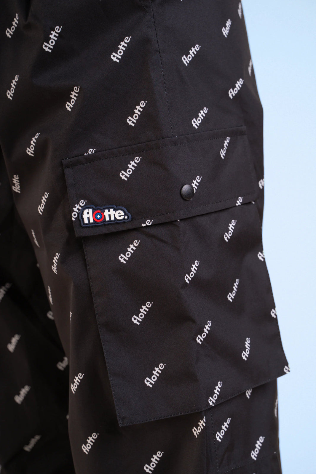 Gambetta multi-pocket cargo waterproof pants printed with #couleur_monogramme